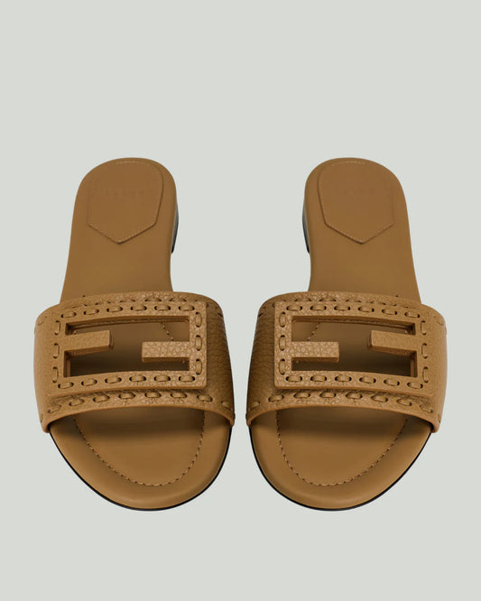 Fendi Baguette Leather Slide Sandals in camel tan, top view showing FF logo strap with whipstitch detailing