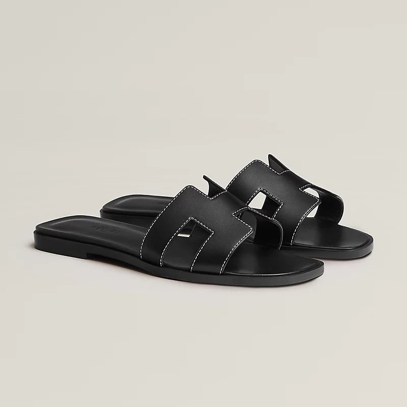 Hermès Oran Leather Flat Sandals — Black