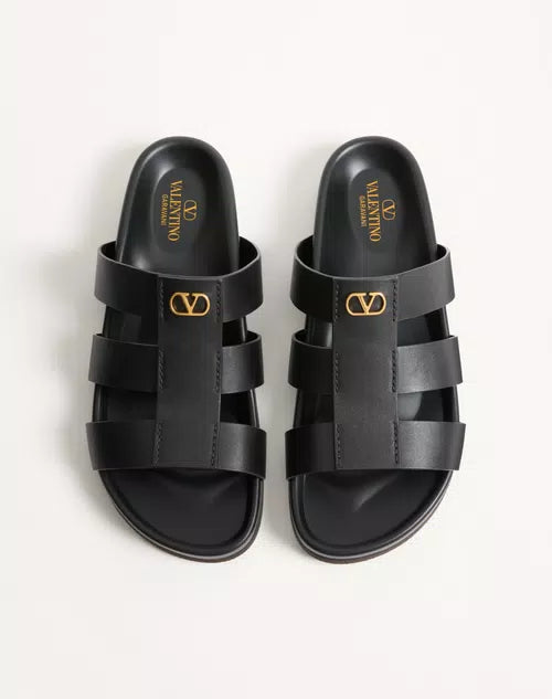 Valentino Garavani VLogo Signature Slide Sandal in Black Calfskin with Gold VLogo Hardware